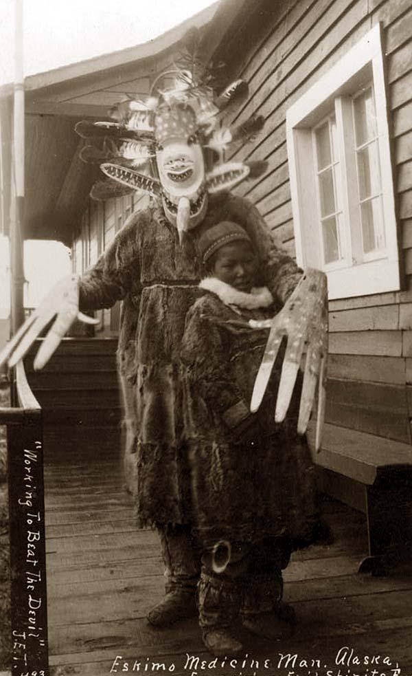 Inuit_medicine_man_and_boy_1900